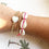 Neon cowrie shell bracelet