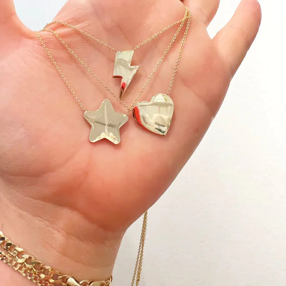 Large bolt, star, and heart necklaces