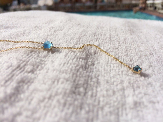 14 Karat Yellow Gold Blue Topaz Lariat Necklace 