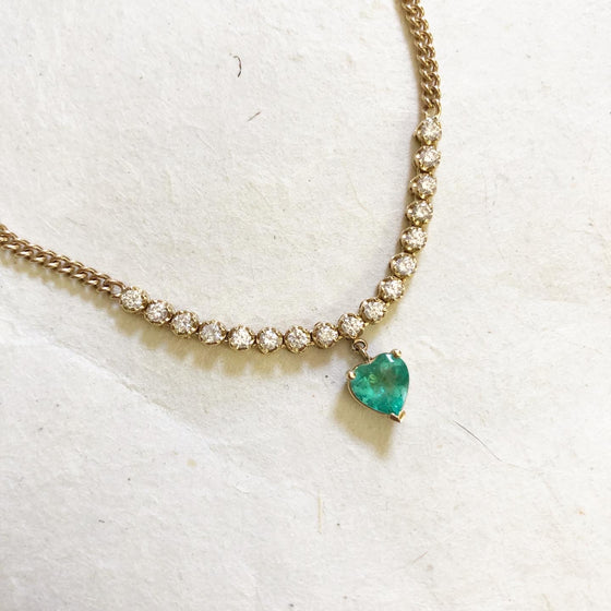 Diamond tennis necklace with emerald heart