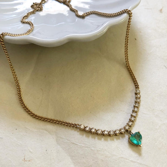 Diamond tennis necklace with emerald heart