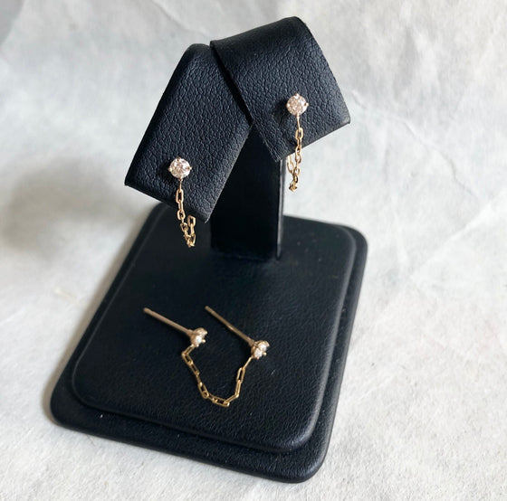 Diamond and chain earrings