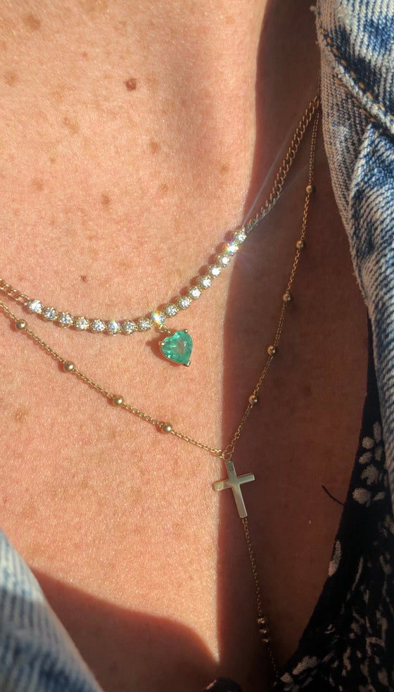 Diamond tennis necklace with emerald heart