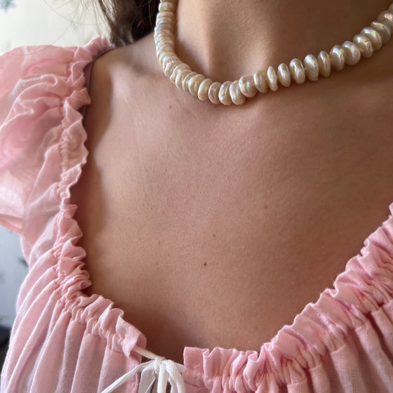 Pearl puka strand